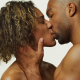 man and woman kissing