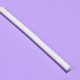 a white implant rod laid over a purple surface