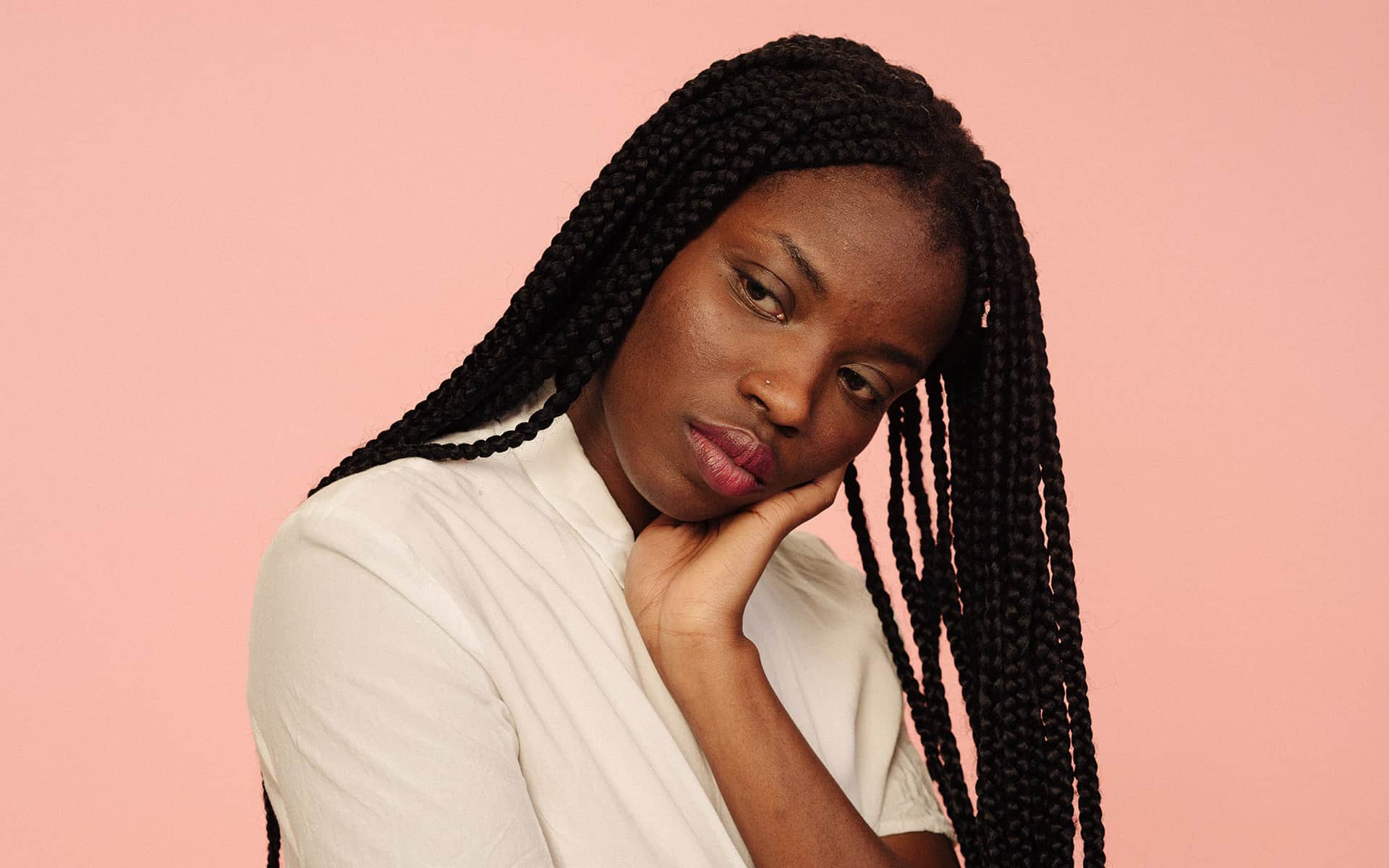 Woman looking confused and thinking deeply