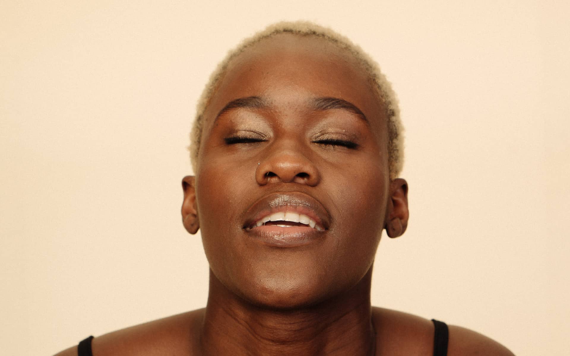 Close-up of a woman's face, blissful