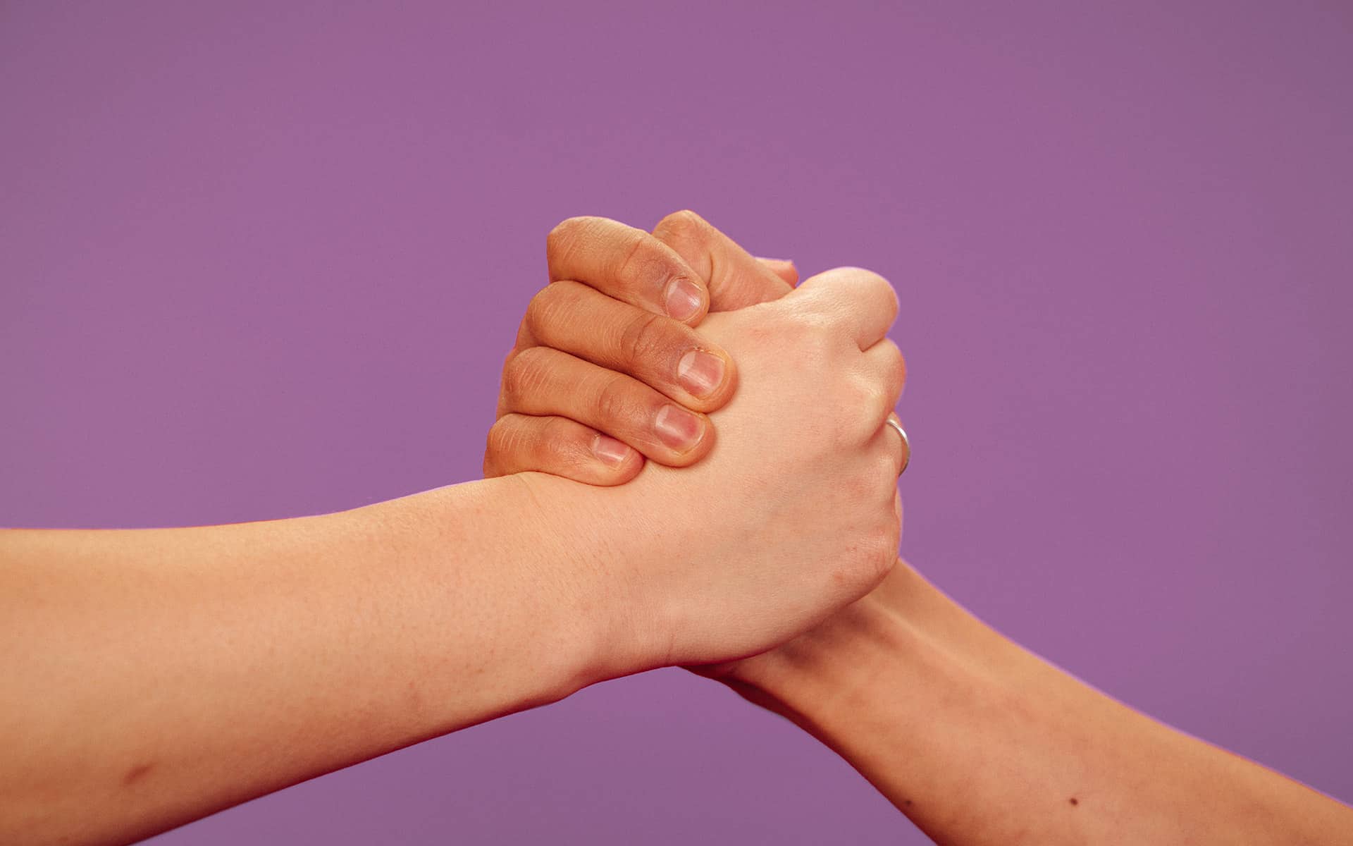 Hands embracing, in support for each other