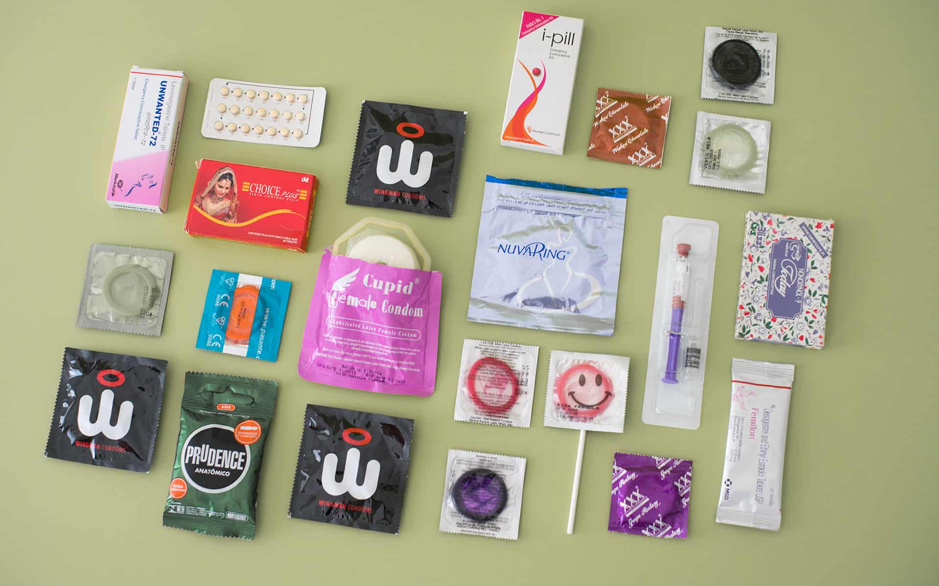 Various birth control methods on an olive green background