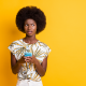confused woman holding phone