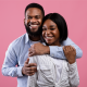 man hugging lady from behind