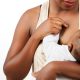 African young Mother breastfeeding her little baby in her arms