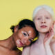 Group of multiethnic women with different kind of skin posing together in studio. Concept about body positivity and self acceptance